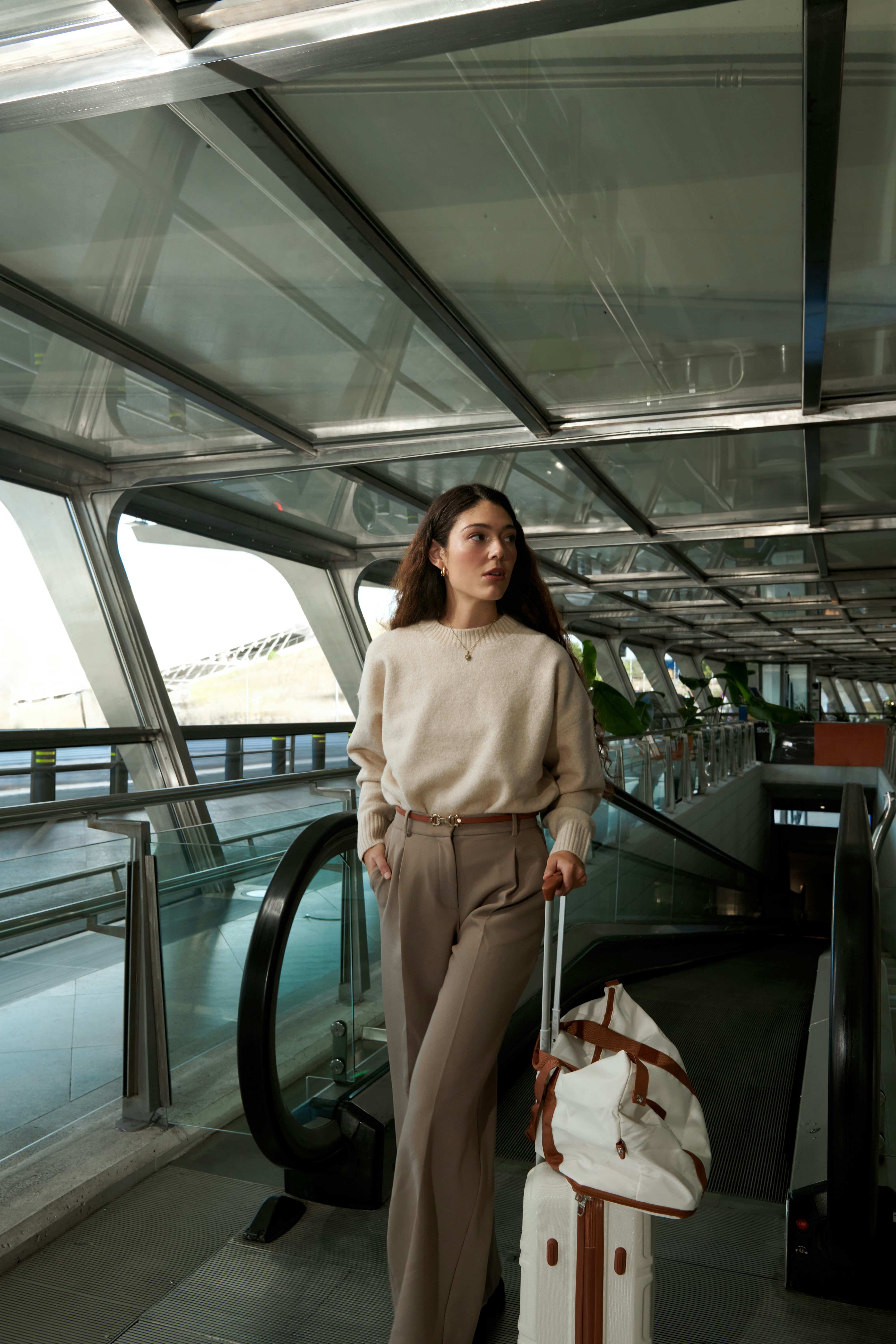 Traveler stepping into an airport ride